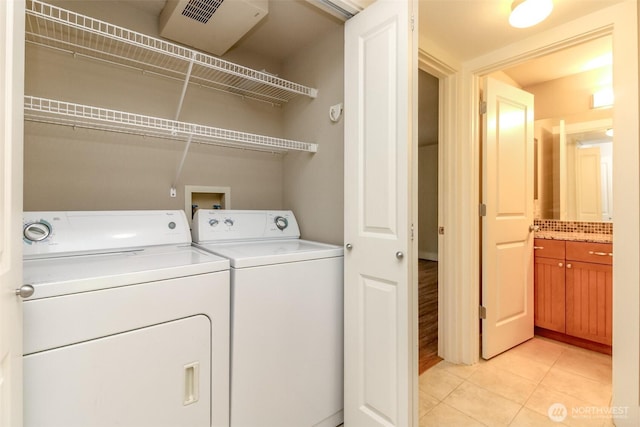 3008 N Narrows Dr Unit B102, Tacoma, WA 98407 - washroom with independent washer and dryer and light tile patterned flooring