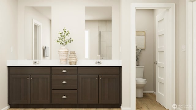4184 SW Rustler St, Port Orchard, WA 98367 - bathroom featuring double vanity and wood finished floors