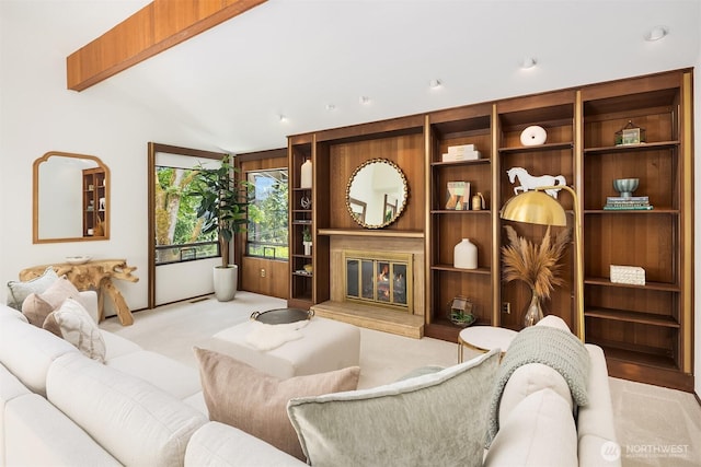 5665 E Mercer Way, Mercer Island, WA 98040 - living area with a glass covered fireplace, carpet, lofted ceiling, and recessed lighting