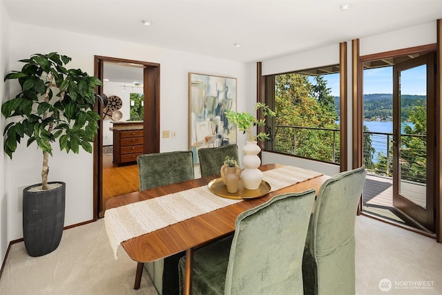 5665 E Mercer Way, Mercer Island, WA 98040 - dining area with a water view, light carpet, and recessed lighting