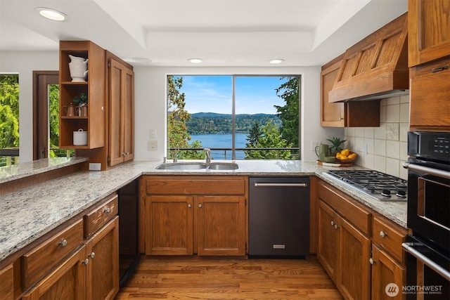 5665 E Mercer Way, Mercer Island, WA 98040 - kitchen featuring appliances with stainless steel finishes, open shelves, healthy amount of natural light, light stone counters, and recessed lighting
