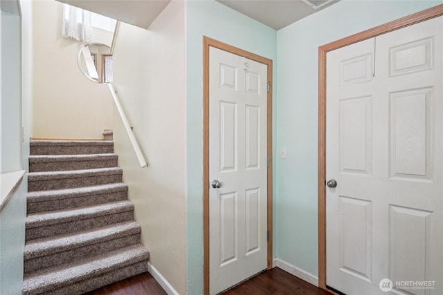 17707 1st Avenue Ct E, Spanaway, WA 98387 - stairway featuring wood finished floors and baseboards