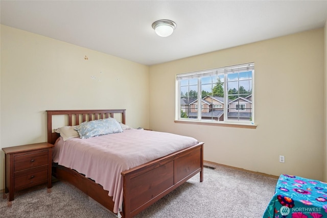 17707 1st Avenue Ct E, Spanaway, WA 98387 - carpeted bedroom featuring baseboards