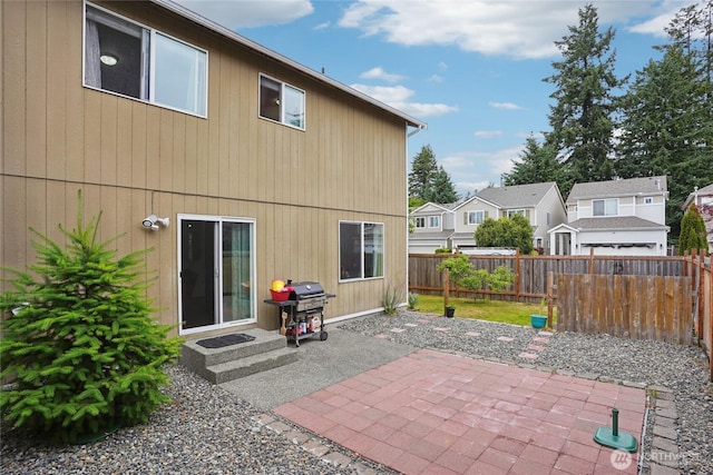 17707 1st Avenue Ct E, Spanaway, WA 98387 - rear view of property featuring a patio area and a residential view