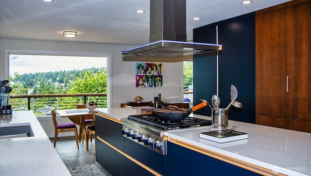 220 Colman Dr, Port Townsend, WA 98368 - kitchen featuring island exhaust hood, stainless steel gas cooktop, recessed lighting, modern cabinets, and plenty of natural light