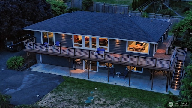 220 Colman Dr, Port Townsend, WA 98368 - back of house featuring a patio area, a shingled roof, a wooden deck, driveway, and stairs