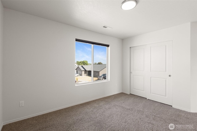 928 N Washington Ct, Moses Lake, WA 98837 - unfurnished bedroom with carpet floors and a closet