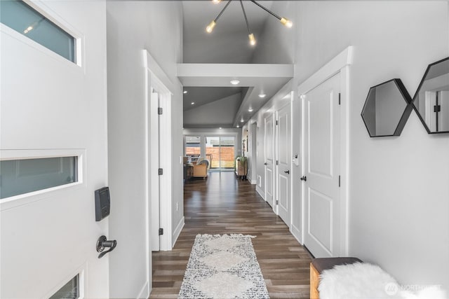477 Ocean Shores Blvd SW, Ocean Shores, WA 98569 - hall featuring dark wood-style flooring, a towering ceiling, a chandelier, and recessed lighting