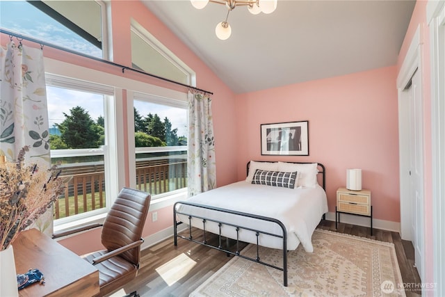 477 Ocean Shores Blvd SW, Ocean Shores, WA 98569 - bedroom featuring vaulted ceiling and wood finished floors