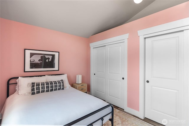 477 Ocean Shores Blvd SW, Ocean Shores, WA 98569 - bedroom featuring lofted ceiling and a closet