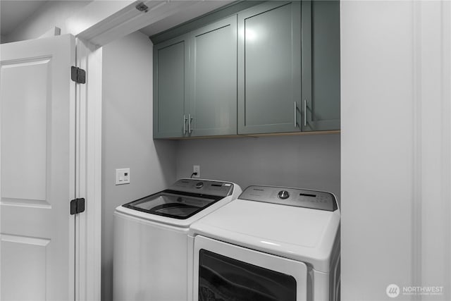 477 Ocean Shores Blvd SW, Ocean Shores, WA 98569 - washroom with independent washer and dryer and cabinet space