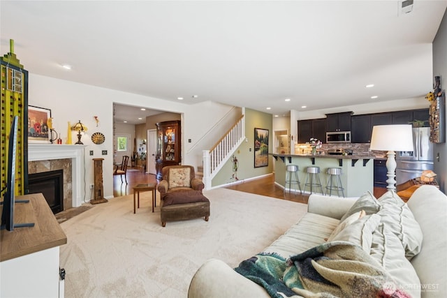 26707 NE 144th Ct, Duvall, WA 98019 - living area featuring stairway, recessed lighting, and a tile fireplace