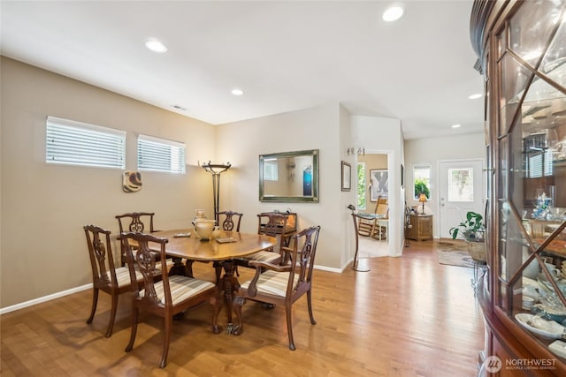 26707 NE 144th Ct, Duvall, WA 98019 - dining room with light wood-style flooring and recessed lighting