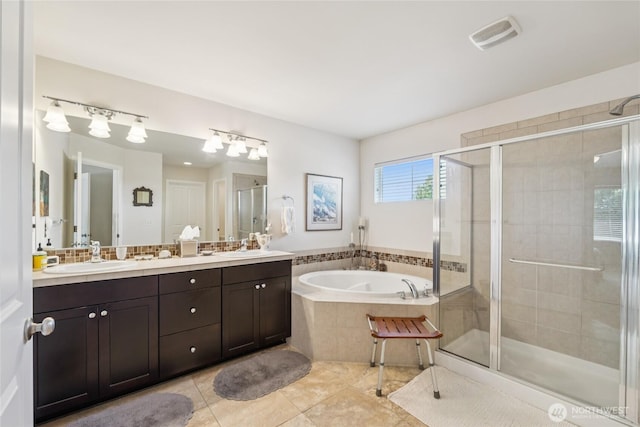 26707 NE 144th Ct, Duvall, WA 98019 - bathroom featuring a shower stall, a bath, double vanity, and tile patterned flooring
