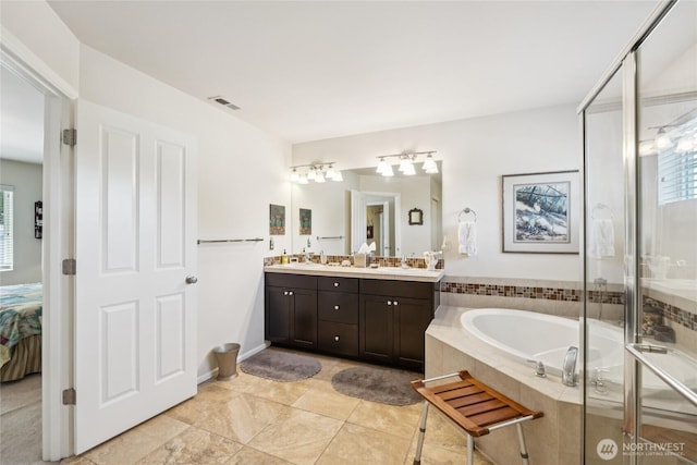 26707 NE 144th Ct, Duvall, WA 98019 - bathroom featuring double vanity, a bath, plenty of natural light, and ensuite bathroom