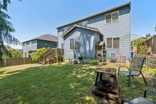 26707 NE 144th Ct, Duvall, WA 98019 - back of house with a fenced backyard