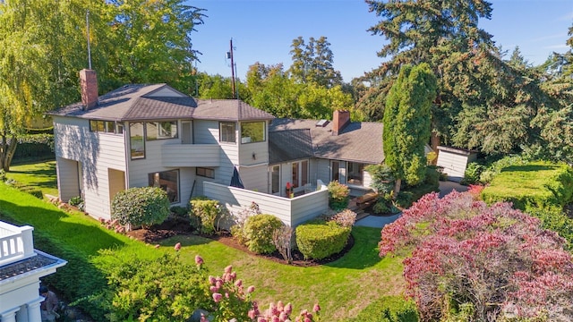 4662 95th Ave NE, Yarrow Point, WA 98004 - back of property with a chimney and a lawn