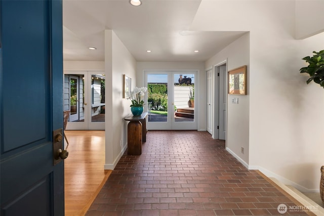 4662 95th Ave NE, Yarrow Point, WA 98004 - entrance foyer featuring brick flooring, french doors, and recessed lighting