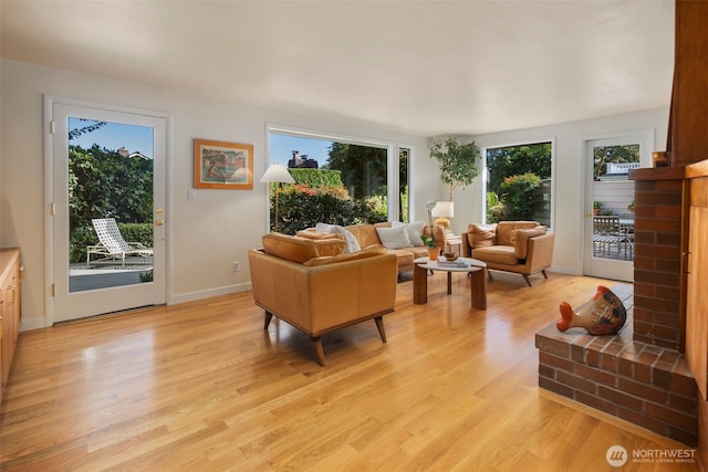 4662 95th Ave NE, Yarrow Point, WA 98004 - living area featuring plenty of natural light and light wood-style floors