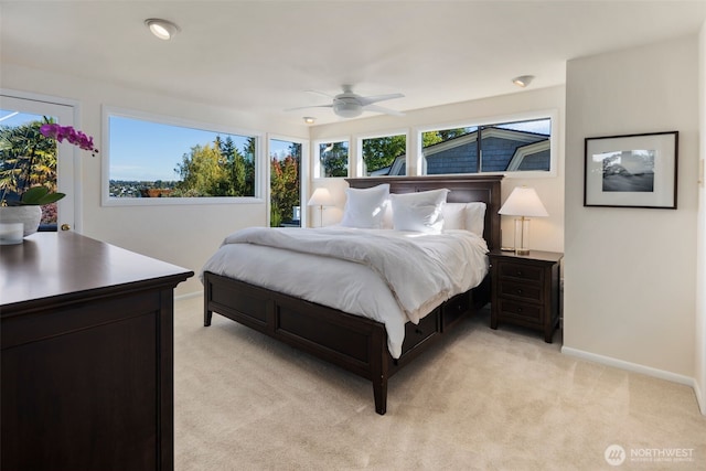 4662 95th Ave NE, Yarrow Point, WA 98004 - bedroom with multiple windows, light carpet, and ceiling fan