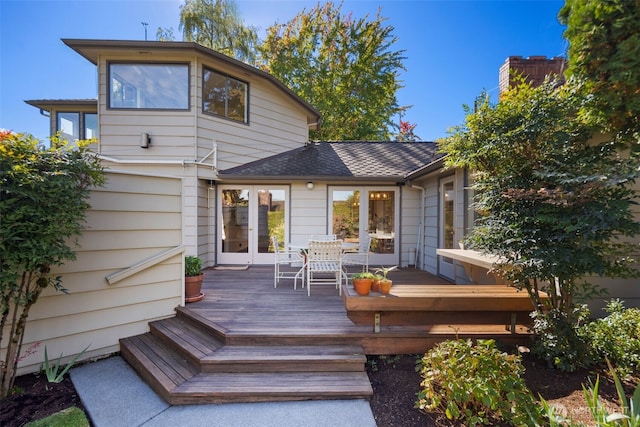 4662 95th Ave NE, Yarrow Point, WA 98004 - back of property featuring roof with shingles and a wooden deck
