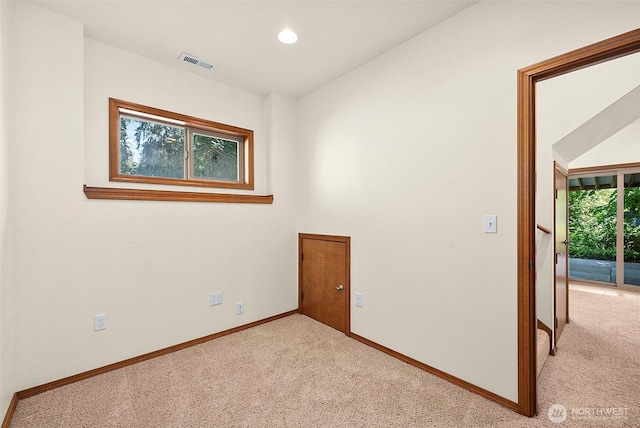 4120 Lake House Ln SE, Olympia, WA 98513 - empty room featuring light colored carpet and recessed lighting