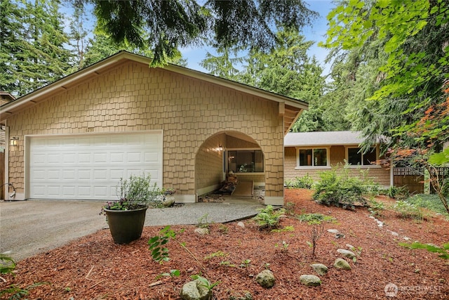 8200 NE View Ridge Ln, Poulsbo, WA 98370 - view of front of house with asphalt driveway