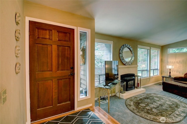 908 185th St SW, Lynnwood, WA 98037 - entryway featuring plenty of natural light and a wood stove