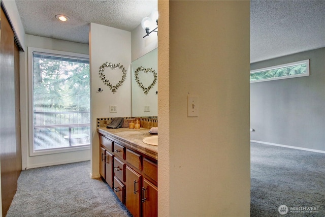 908 185th St SW, Lynnwood, WA 98037 - bathroom with a textured ceiling and vanity