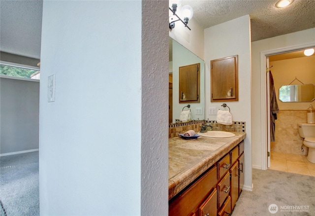 908 185th St SW, Lynnwood, WA 98037 - full bath with vanity, a textured ceiling, and tile patterned floors