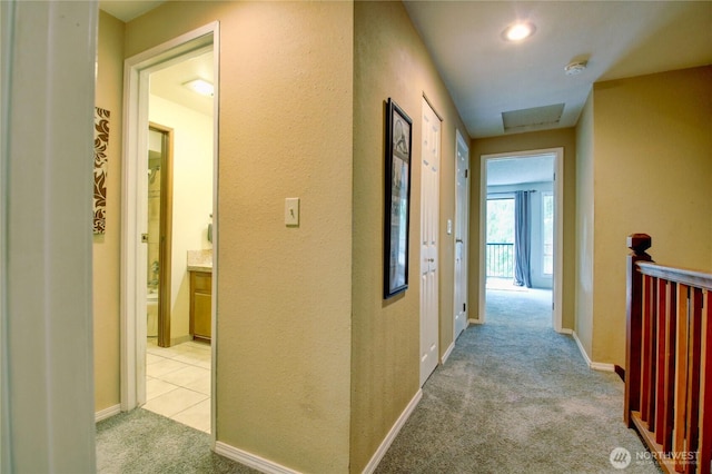 908 185th St SW, Lynnwood, WA 98037 - corridor with light carpet and an upstairs landing