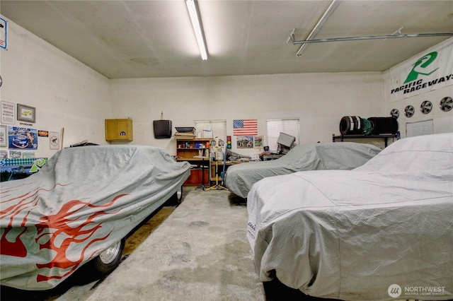 908 185th St SW, Lynnwood, WA 98037 - bedroom featuring concrete flooring and a garage