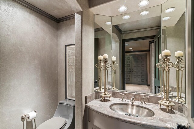 1504 E Lakeshore Dr, Lake Stevens, WA 98258 - bathroom featuring ornamental molding, vanity, and a textured wall