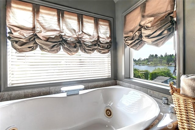 1504 E Lakeshore Dr, Lake Stevens, WA 98258 - bathroom featuring a jetted tub and a water view