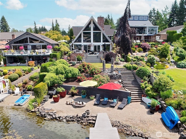 1504 E Lakeshore Dr, Lake Stevens, WA 98258 - rear view of house with a chimney