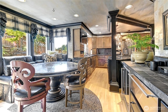 1504 E Lakeshore Dr, Lake Stevens, WA 98258 - dining space featuring light wood-type flooring, recessed lighting, and a chandelier