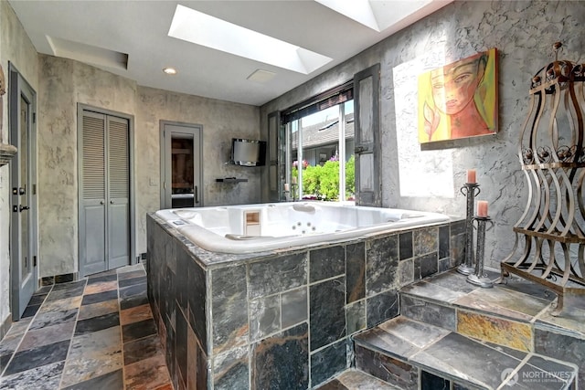 1504 E Lakeshore Dr, Lake Stevens, WA 98258 - kitchen featuring a skylight and stone tile flooring