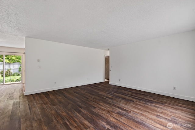 1538 Orchid Ct, Longview, WA 98632 - empty room featuring dark wood-style flooring and a textured ceiling