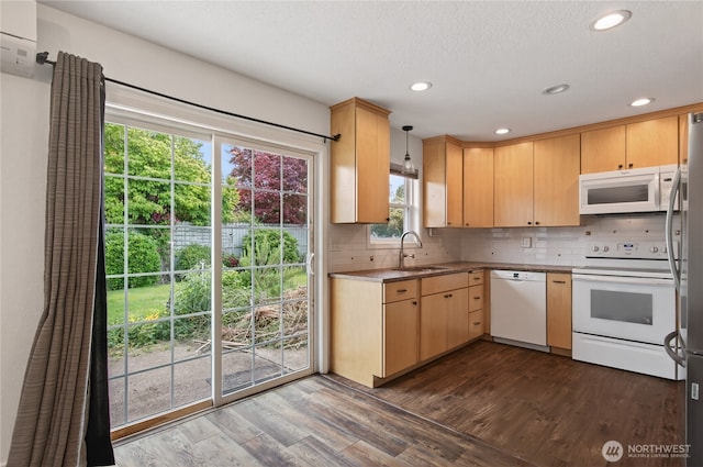 1538 Orchid Ct, Longview, WA 98632 - kitchen featuring white appliances, light brown cabinets, backsplash, dark wood-style flooring, and recessed lighting