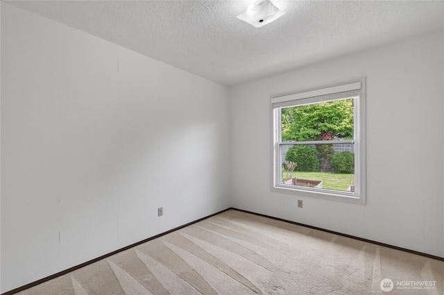 1538 Orchid Ct, Longview, WA 98632 - unfurnished room with a textured ceiling and light carpet