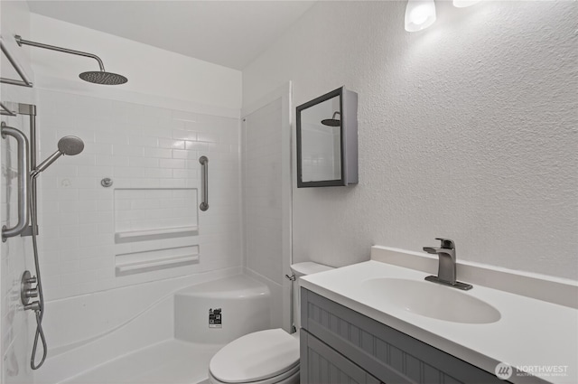 1538 Orchid Ct, Longview, WA 98632 - bathroom featuring a shower, vanity, and a textured wall
