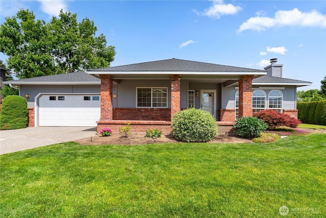 840 Amy Ct, East Wenatchee, WA 98802 - view of front facade with brick siding, a garage, driveway, and a front lawn