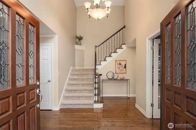 2778 142nd Pl NE, Bellevue, WA 98007 - foyer featuring stairway, dark wood-style flooring, a chandelier, and a towering ceiling