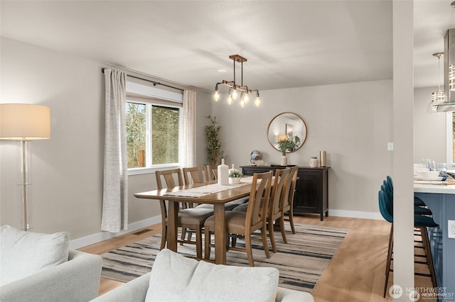 5113 212th St SW, Lynnwood, WA 98036 - dining space with light wood-type flooring and baseboards