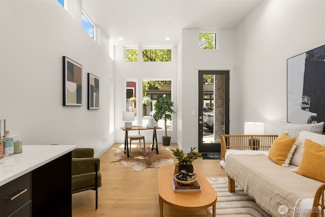 1108A 34th Ave, Seattle, WA 98122 - bedroom featuring a towering ceiling and light wood finished floors