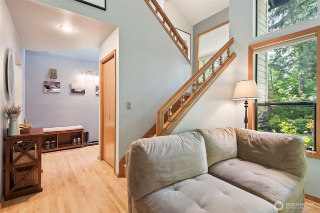 24230 218th Ave SE, Maple Valley, WA 98038 - living room with light wood-style floors and stairs