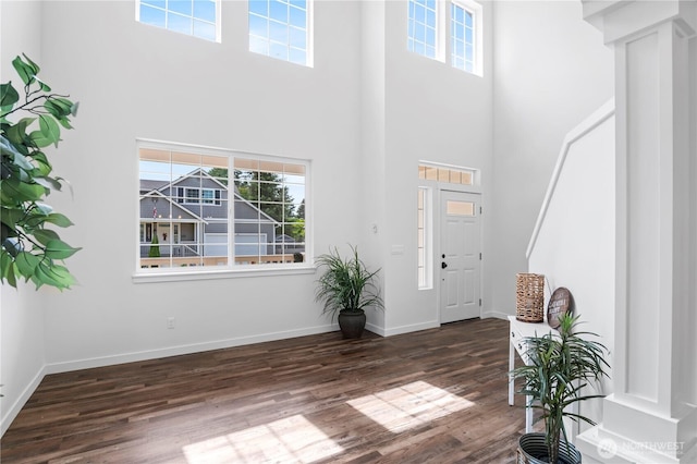 1611 Austin Ave, Snohomish, WA 98290 - entrance foyer with decorative columns, a towering ceiling, and wood finished floors