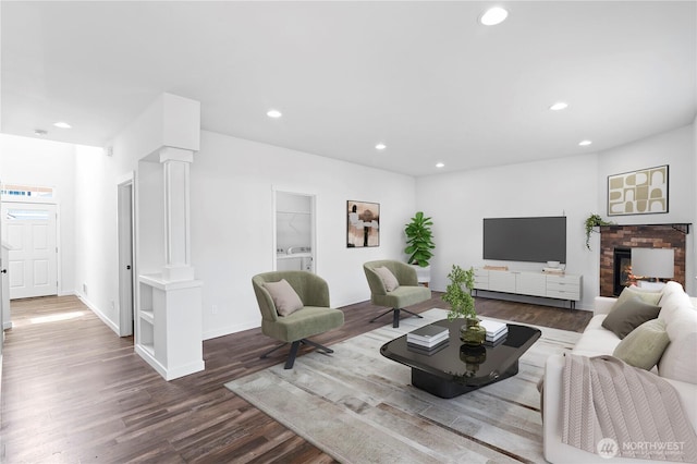 1611 Austin Ave, Snohomish, WA 98290 - living area with ornate columns, recessed lighting, and wood finished floors