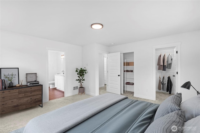 1611 Austin Ave, Snohomish, WA 98290 - carpeted bedroom featuring ensuite bath and a walk in closet