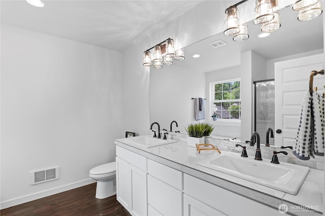 1611 Austin Ave, Snohomish, WA 98290 - full bath featuring double vanity, an enclosed shower, wood finished floors, a chandelier, and recessed lighting